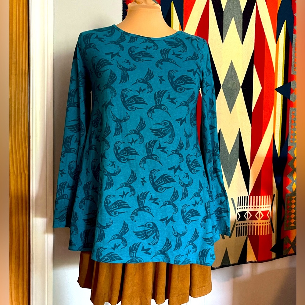 Teal long sleeve top with West Coast Indigenius hummingbird pattern